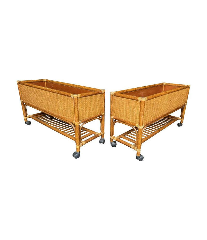 A pair of large Italian 1970s bamboo and rattan planters on castors