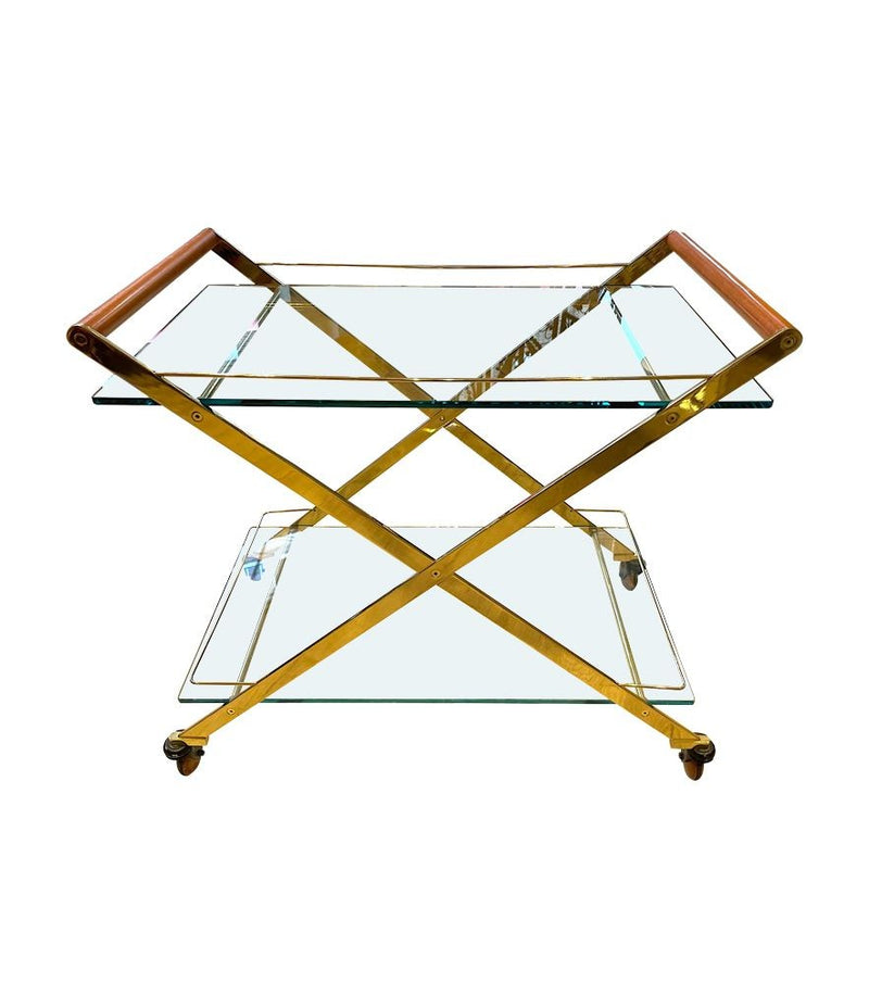 A 1980s Gallotti and Radice “Mister” bar trolley with brass frame and cherry wood handles.