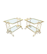 A pair of 1950s gilt wrought iron French side tables, with glass shelves