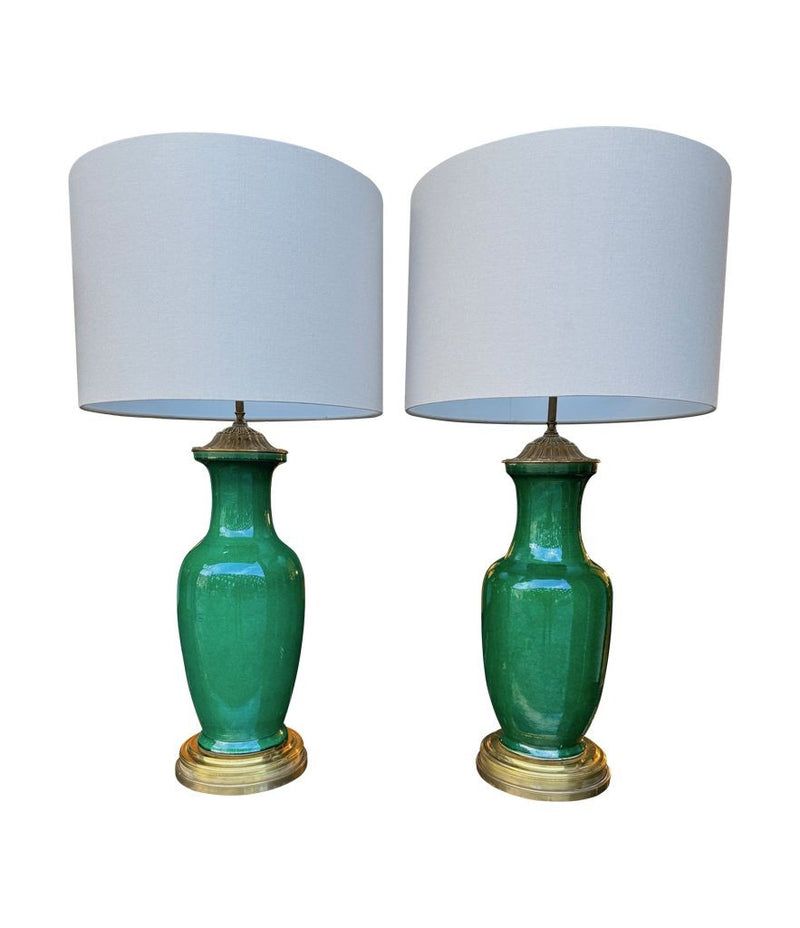 A lovely large pair of 1950s Italian crackle glaze green vase lamps with solid brass bases