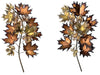 A pair of large 1970s Curtis Jere torch cut brass and bronze maple leaf sculptures