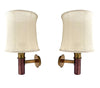 A rare pair of orignal 1960s copper and brass wall sconces by Stilnovo, with orignal labels