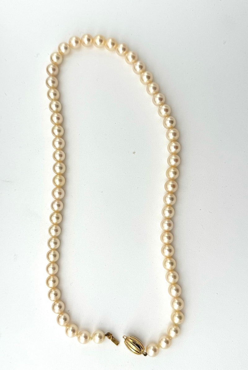 A lovely late 1980s Mappin and Webb Akoya pearl necklace with 18carat gold clasp in orignal box