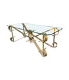 A Spanish 1950s gilt wrought iron coffee table with thick glass top