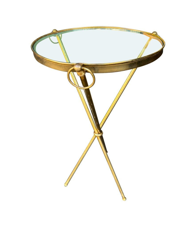 A lovely 1950s Fontana Arte style solid brass tripod martini table with thick glass top