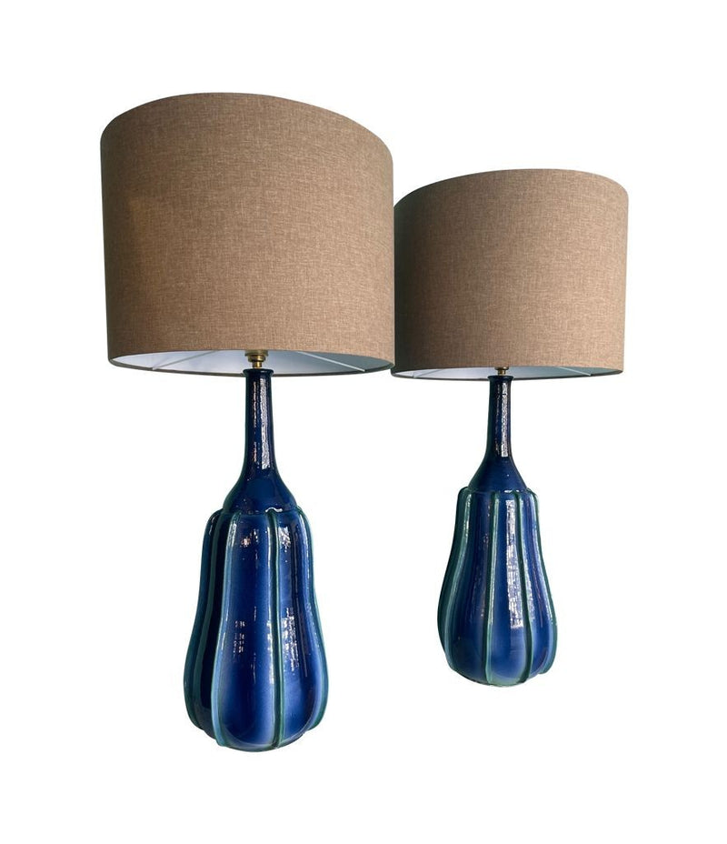 A stunning large pair of 1980s Italian blue and green ceramic lamps with bespoke linen shades