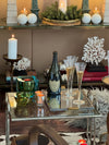 A pair of 1950s gilt wrought iron French side tables, with glass shelves