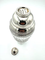 An Italian 1940s crystal and silver cocktail shaker by Florentine silversmith Italo Gori