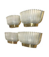 A lovely pair of 1940s Art Deco opaque Murano glass ribbed wall sconces by Seguso with brass wall mounts