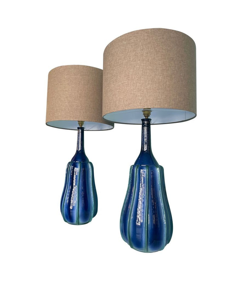 A stunning large pair of 1980s Italian blue and green ceramic lamps with bespoke linen shades