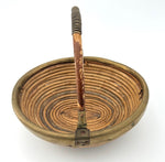 An Italian 1970s woven bamboo and brass bowl in the style of Gabriella Crespi