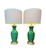 A lovely large pair of 1950s Italian crackle glaze green vase lamps with solid brass bases