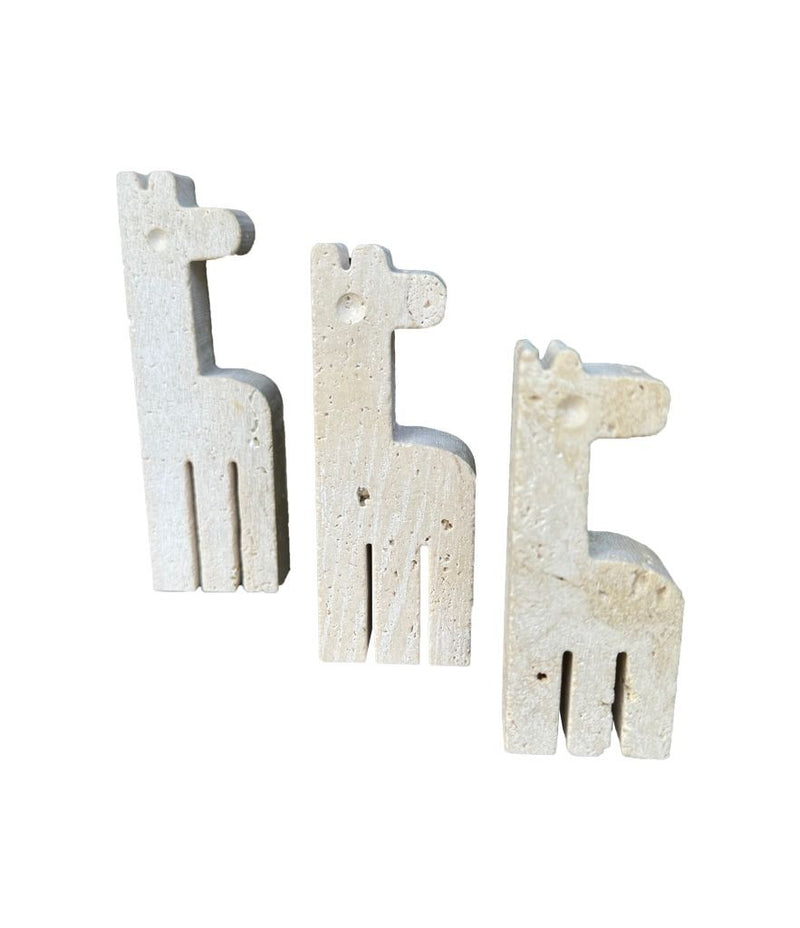 A set of three 1970s Fratelli Mannelli travertine giraffes