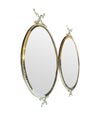 Mid century mirrors Italian oval with brass frame and dolphin detailing.