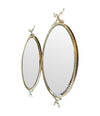 Mid century mirrors Italian oval with brass frame and dolphin detailing.