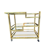 Mid century Romeo Rega Italian gilt metal bar trolley with smoked glass shelves