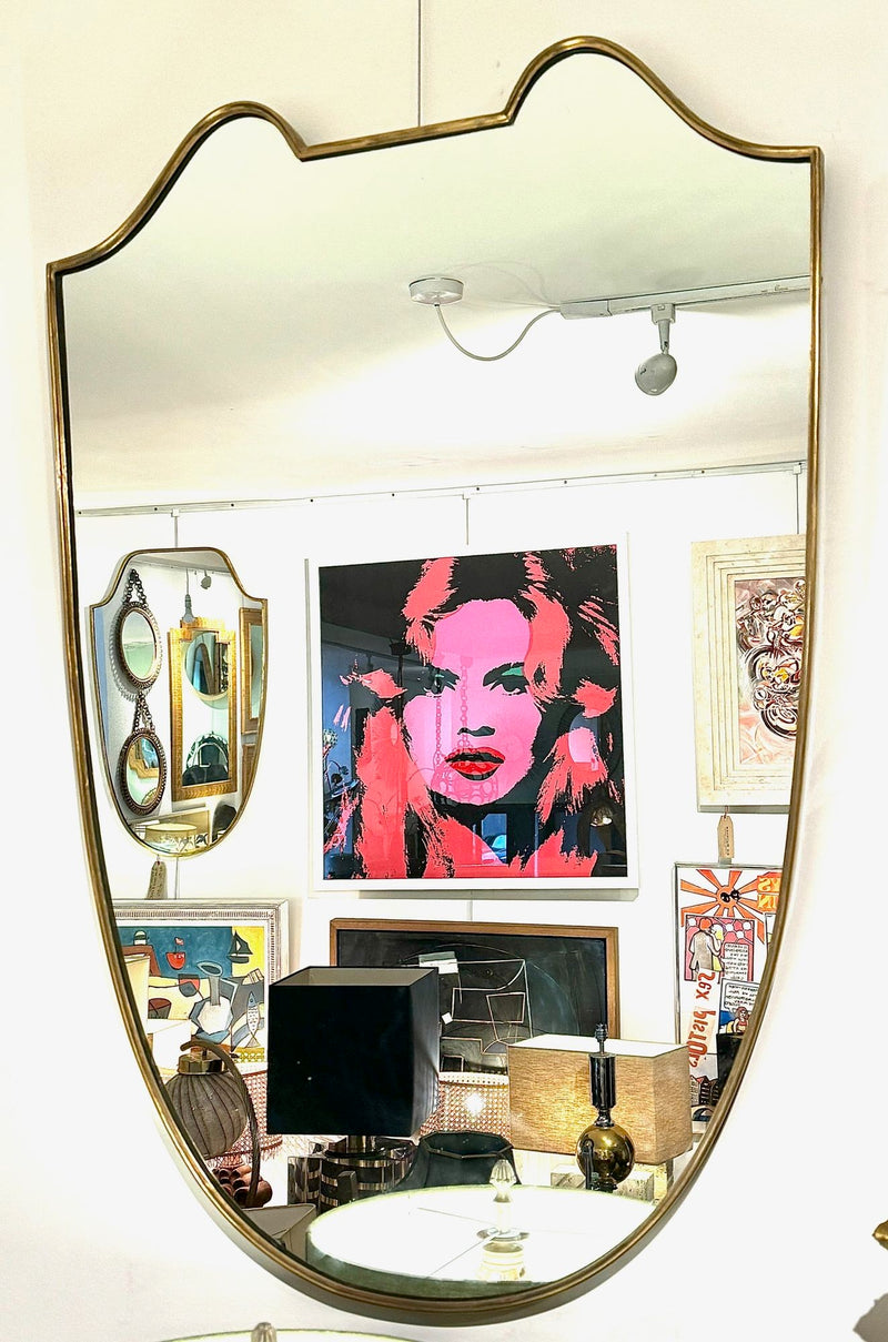 An orignal Italian 1950s shield mirror with orignal mirror plate