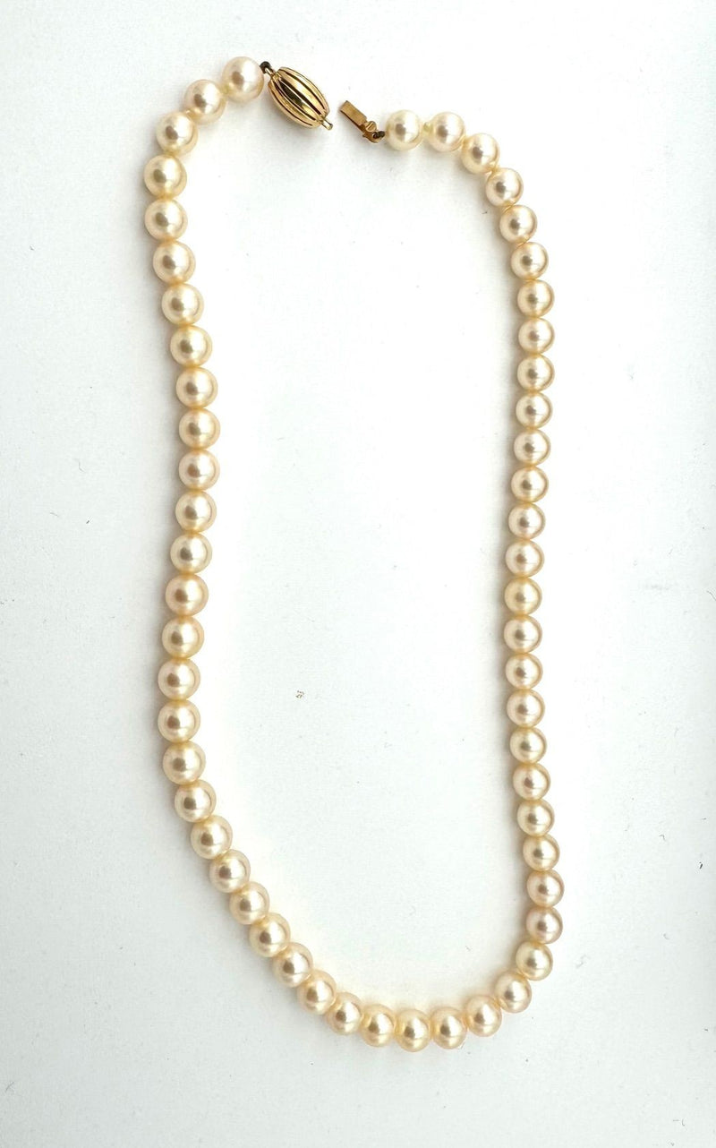 A lovely late 1980s Mappin and Webb Akoya pearl necklace with 18carat gold clasp in orignal box