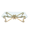 A Spanish 1950s gilt wrought iron coffee table with thick glass top