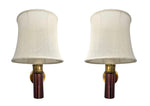 A rare pair of orignal 1960s copper and brass wall sconces by Stilnovo, with orignal labels