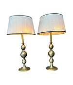 A pair of large Italian 1970s solid brass lamps with orignal satin shades