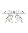 A pair of 1950s gilt wrought iron French side tables, with glass shelves