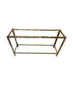 A 1970s Italian solid brass console table with 2 glass shelves