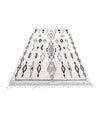 A vintage handwoven Moroccan berber rug, with tribal diamond and line pattern by the Beni Ouarian tribe