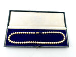 A lovely late 1980s Mappin and Webb Akoya pearl necklace with 18carat gold clasp in orignal box