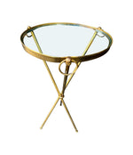 A lovely 1950s Fontana Arte style solid brass tripod martini table with thick glass top