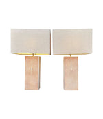 A pair of 1960s pastel pink shagreen lamps with natural linen shades