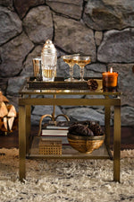 A pair of French 1970s Guy Lefevre style gilt metal side tables