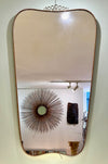 A lovely shaped large original 1950s brass framed mirror in the style of Gio Ponti