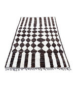 A vintage handmade Beni Ouarian diamond chequerboard and line pattern, Berber rug