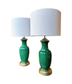 A lovely large pair of 1950s Italian crackle glaze green vase lamps with solid brass bases