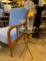 A lovely 1950s Fontana Arte style solid brass tripod martini table with thick glass top