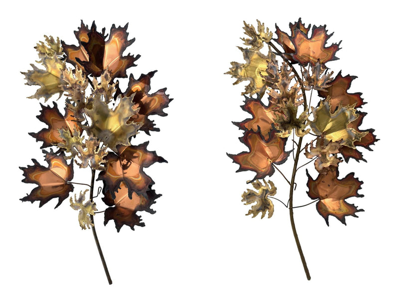 A pair of large 1970s Curtis Jere torch cut brass and bronze maple leaf sculptures