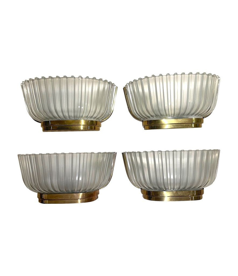 A lovely pair of 1940s Art Deco opaque Murano glass ribbed wall sconces by Seguso with brass wall mounts