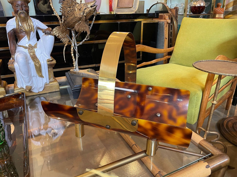 A very chic Italian 1970s faux tortoise shell and brass magazine rack