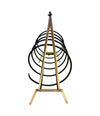 An unusual Italian 1950s mid century brass and black lacquered spiral magazine rack