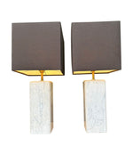 A pair of 1970s Belgian Carrera marble lamps by Porcelaine de Bruxelles