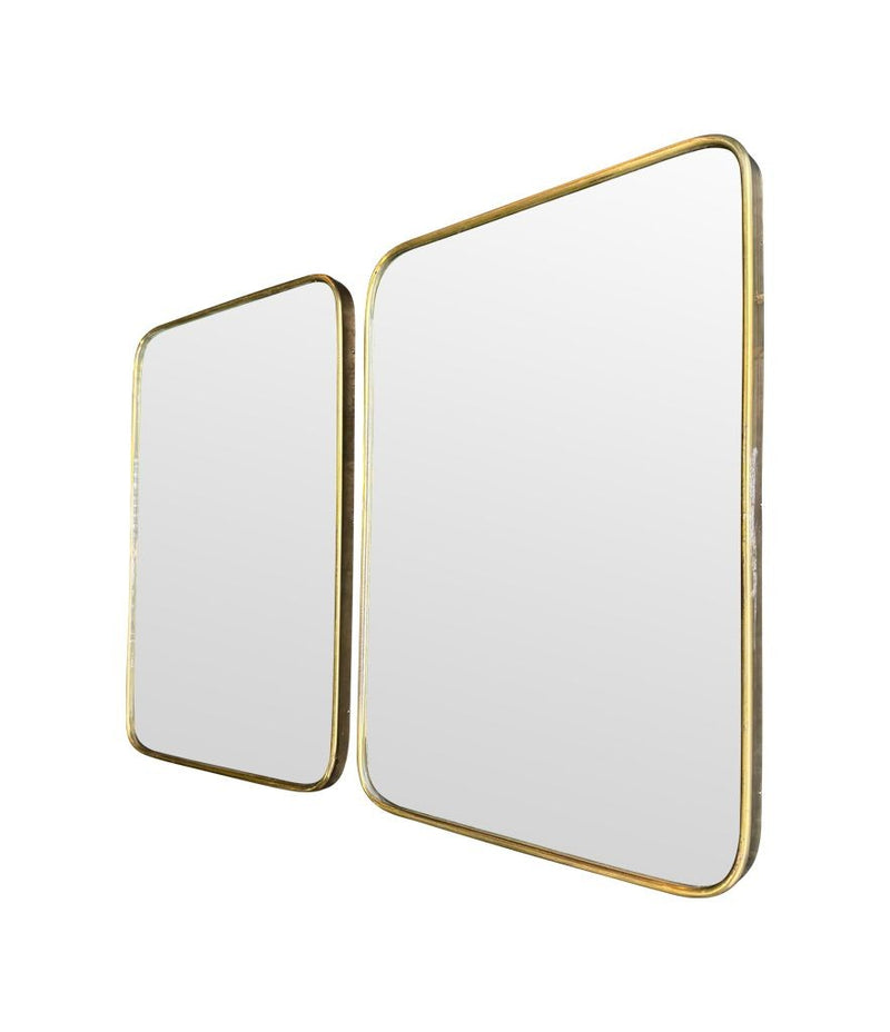 A lovely pair of 1950s Italian brass framed mirrors with solid wood backs