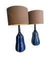 A stunning large pair of 1980s Italian blue and green ceramic lamps with bespoke linen shades