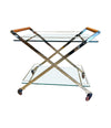 A 1980s Gallotti and Radice “Mister” bar trolley with brass frame and cherry wood handles.