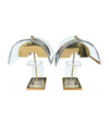 A large unusual pair of 1980s lucite and brass lamps with curved lucite shade and base