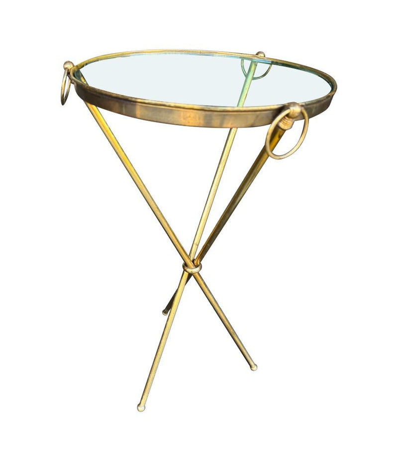 A lovely 1950s Fontana Arte style solid brass tripod martini table with thick glass top