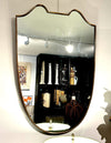 An orignal Italian 1950s shield mirror with orignal mirror plate