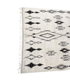 A vintage handwoven Moroccan berber rug, with tribal diamond and line pattern by the Beni Ouarian tribe