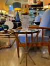 A lovely 1950s Fontana Arte style solid brass tripod martini table with thick glass top