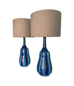 A stunning large pair of 1980s Italian blue and green ceramic lamps with bespoke linen shades